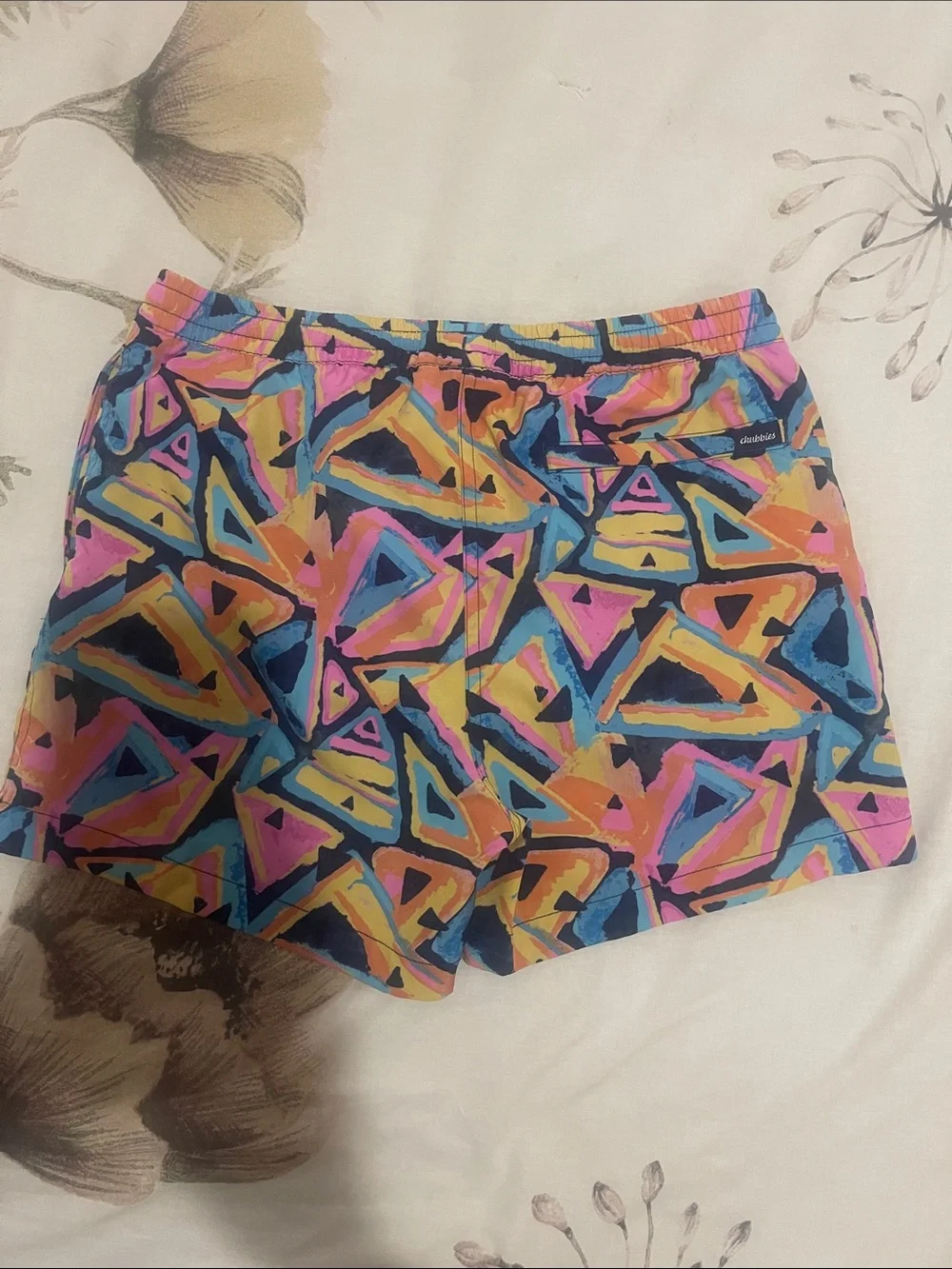 chubbies Kids Neon Geometric Swim Trunks in Pink, Blue, Yellow, Black